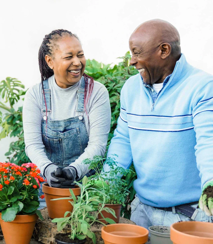 couple planting together and discussing retirement strategies