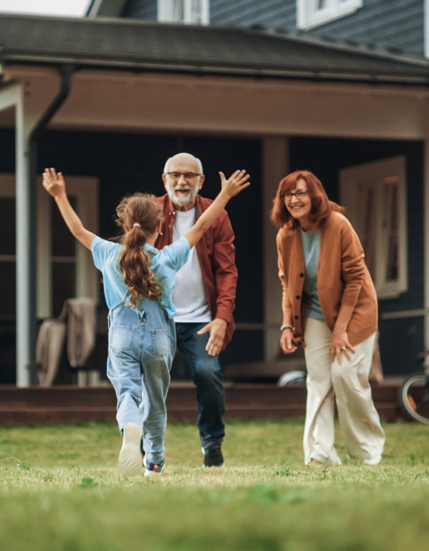 grandparents greeting granddaughter and thinking about tax deferred annuity