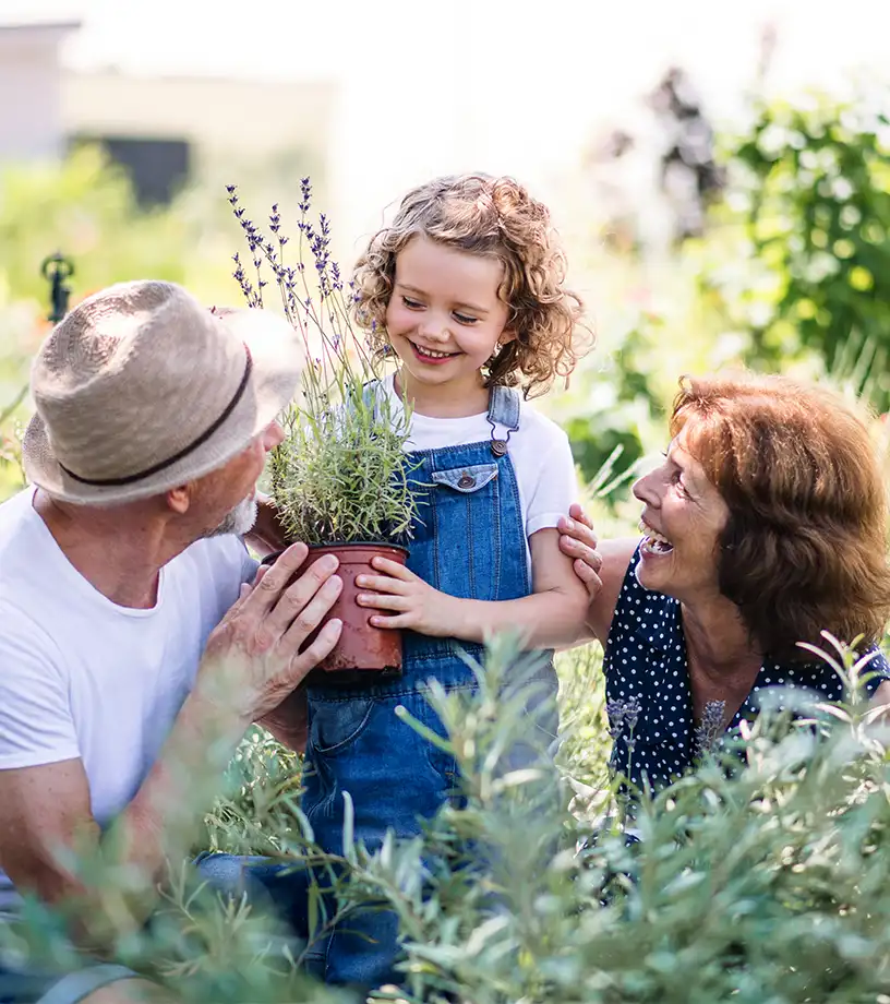 retired couple gardening with their granddaughter safest place for retirement money 1